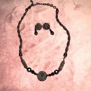 Black metal metal ribbon rose earring and necklace set